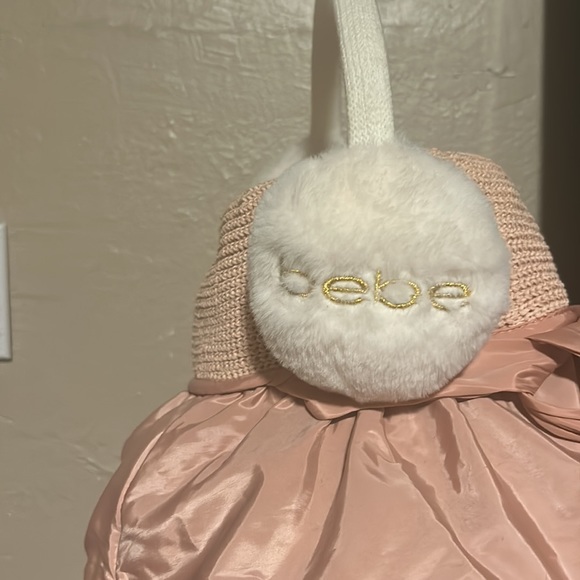 Bebe white furry with gold lettering on each muff! Really warm!!!!! - Picture 4 of 4